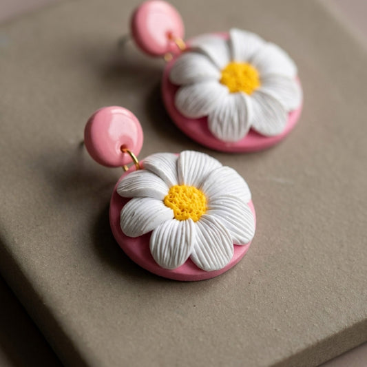 Daisy Lover handmade polymer-clay earrings, close-up detail of one earring