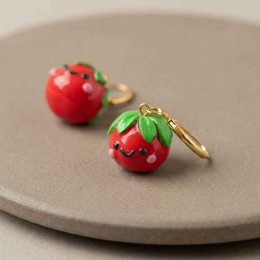 Tomatoes handmade polymer-clay earrings, close-up detail of one earring