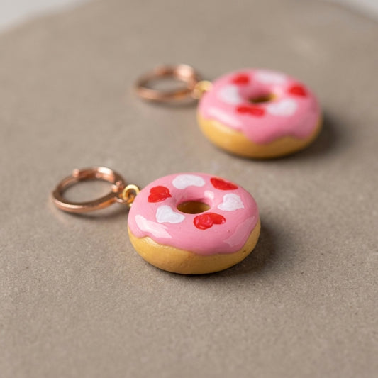 Donut Hearts handmade polymer-clay earrings, close-up detail of one earring