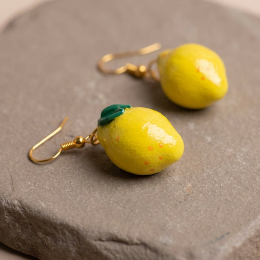 Lemonita handmade polymer-clay earrings, close-up detail of one earring