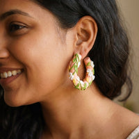 Sunset Hoops handmade polymer-clay earrings, worn on the ear