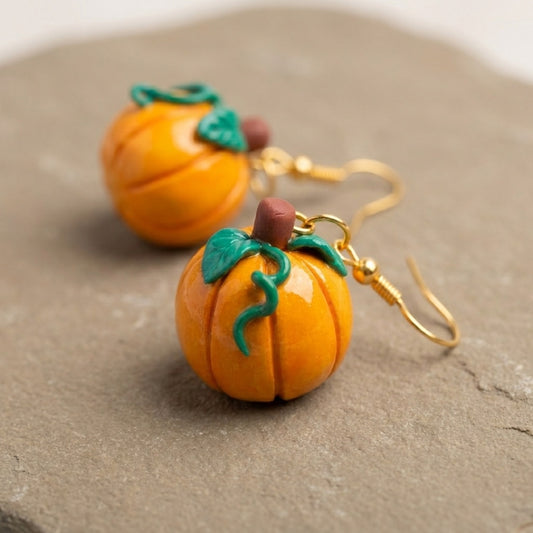 Pumpkiln handmade polymer-clay earrings, close-up detail of one earring