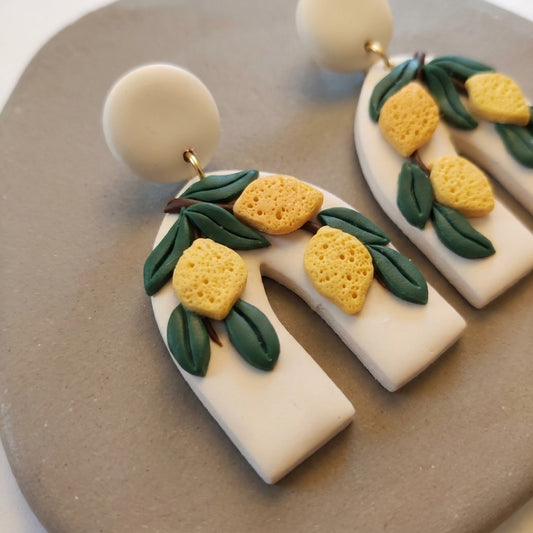 Lemon Botanica handmade polymer-clay earrings, close-up detail of one earring