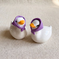 Happy Duck handmade glossy clay desk pal, isometric view