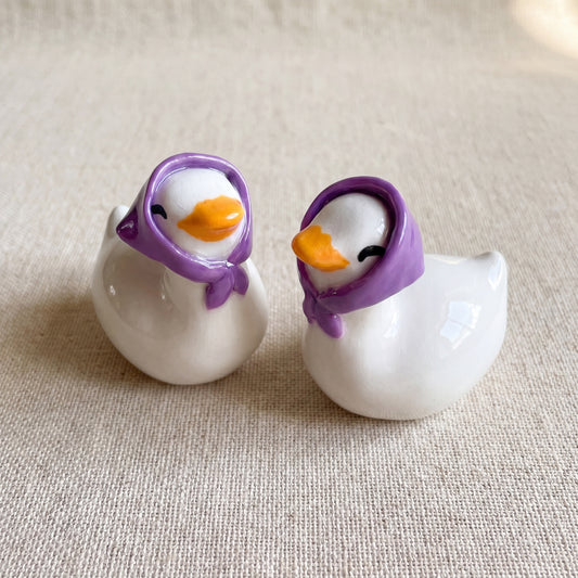 Happy Duck handmade glossy clay desk pal, isometric view