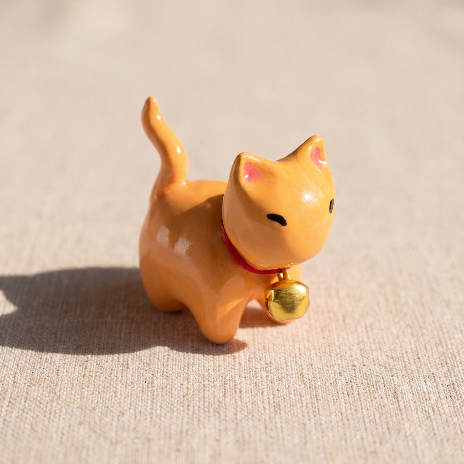 Ginger kitty handmade glossy clay desk pal, front view