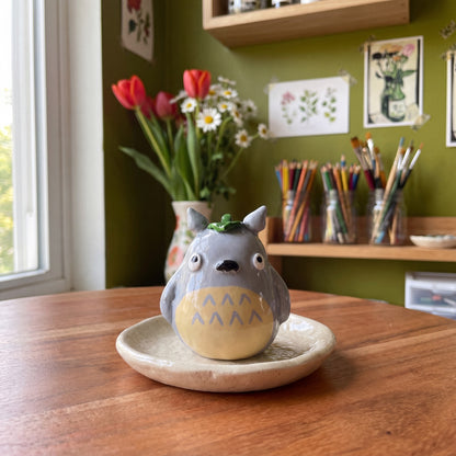 Forest Spirit handmade glossy clay desk pal, styled in the Moon Kiln studio, daytime