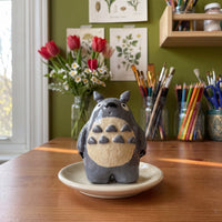 Forest Spirit (Large) handmade glossy clay desk pal, styled in the Moon Kiln studio, daytime