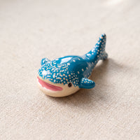 Happy Whale handmade glossy clay desk pal, isometric view