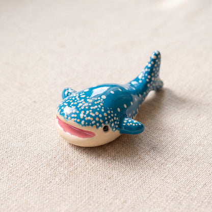 Happy Whale handmade glossy clay desk pal, isometric view