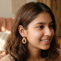 Papaya! handmade polymer-clay earrings, worn on the ear