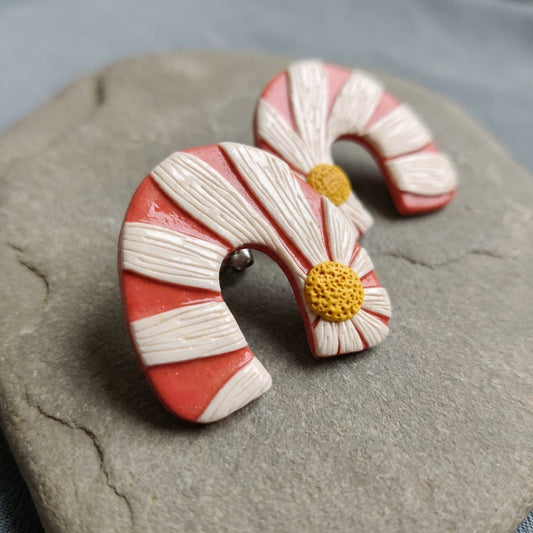 Daisy Bend handmade polymer-clay earrings, close-up detail of one earring