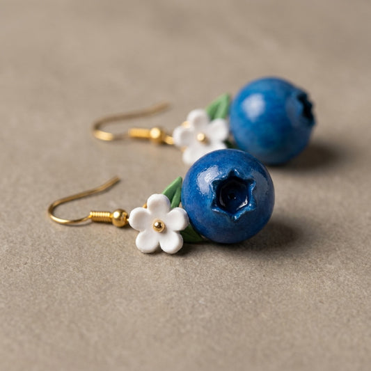 Blueberries handmade polymer-clay earrings, close-up detail of one earring