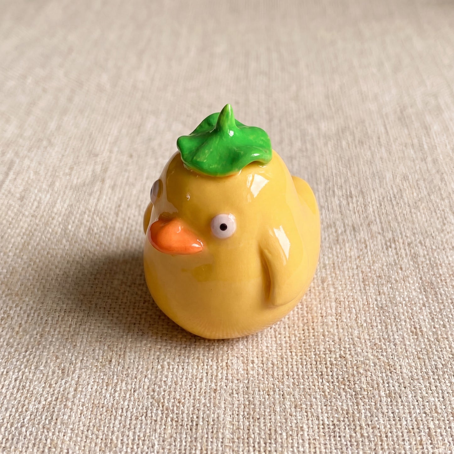 Spirited Ducky handmade glossy clay desk pal, isometric view