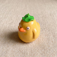 Spirited Ducky handmade glossy clay desk pal, isometric view