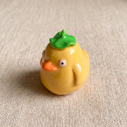 Spirited Ducky handmade glossy clay desk pal, isometric view