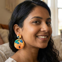 Tropical Daylily handmade polymer-clay earrings, worn on the ear