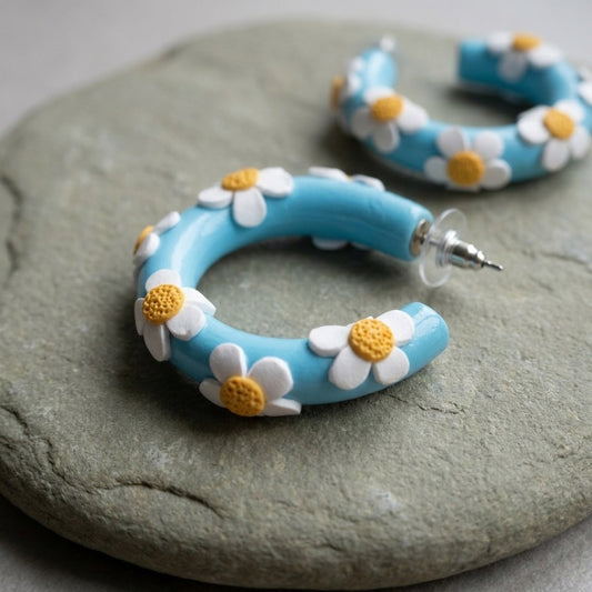 Daisy Blue Hoops handmade polymer-clay earrings, close-up detail of one earring