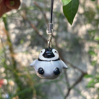 Baby Penguin handmade polymer clay charm, glossy round grey and black penguin chick with white belly, on black cord clasp