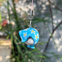 Blue Hooded Bird polymer clay charm, close-up showing bird face with eyebrow detail and blue clay hood