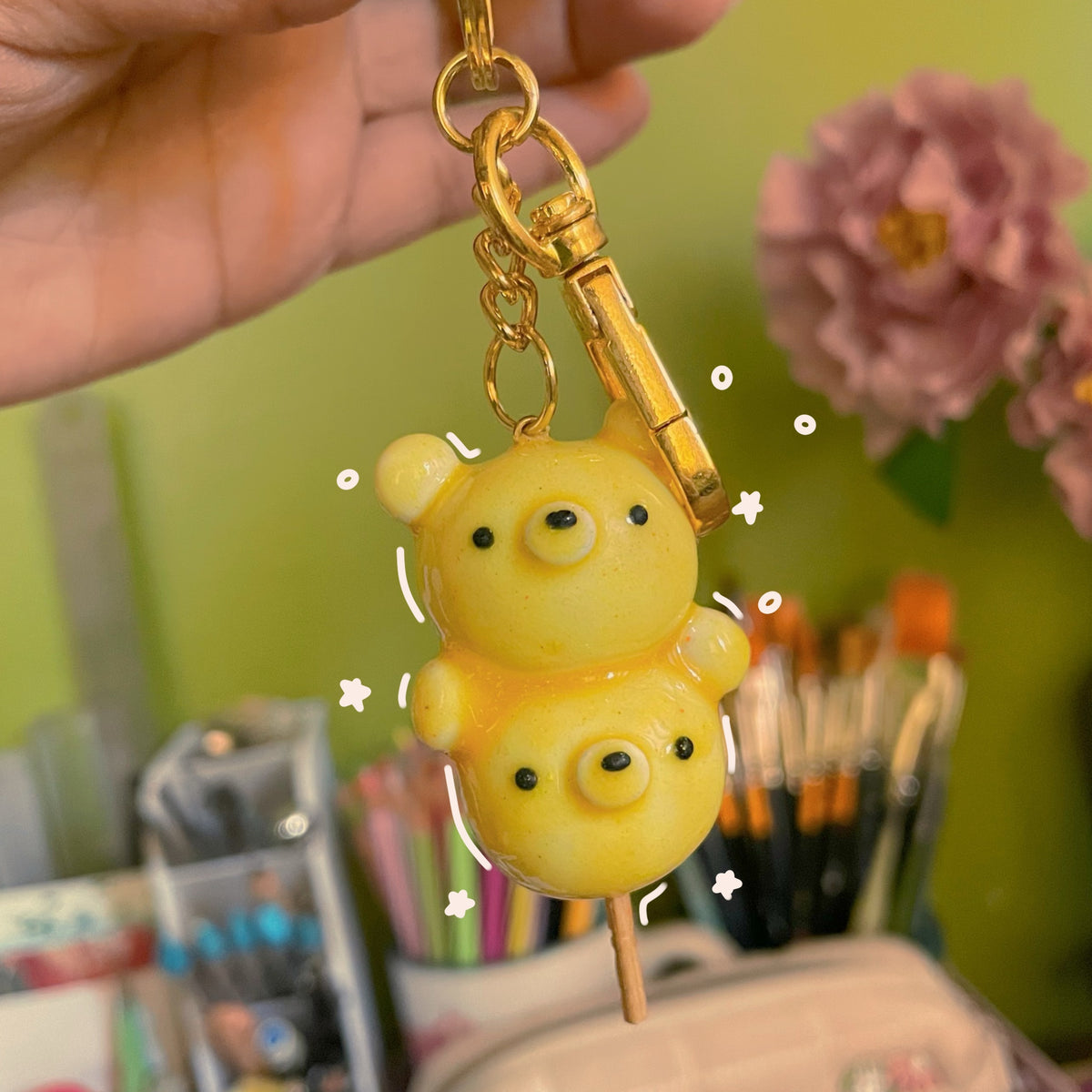 Candy Bear handmade polymer clay keychain, glossy yellow bear skewer figure with two stacked bear bodies on a stick, gold clasp