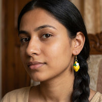 Lemonita handmade polymer-clay earrings, worn on the ear