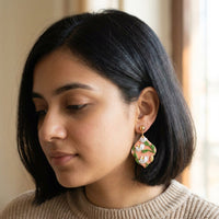 Sunset Bouquet handmade polymer-clay earrings, worn on the ear