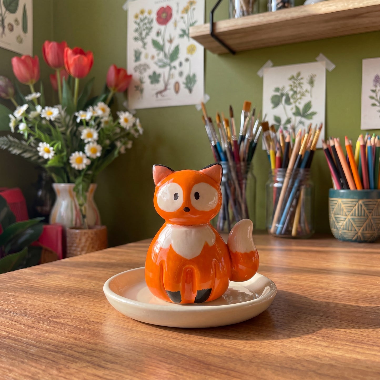 Mr. Fox handmade glossy clay desk pal, styled in the Moon Kiln studio, daytime
