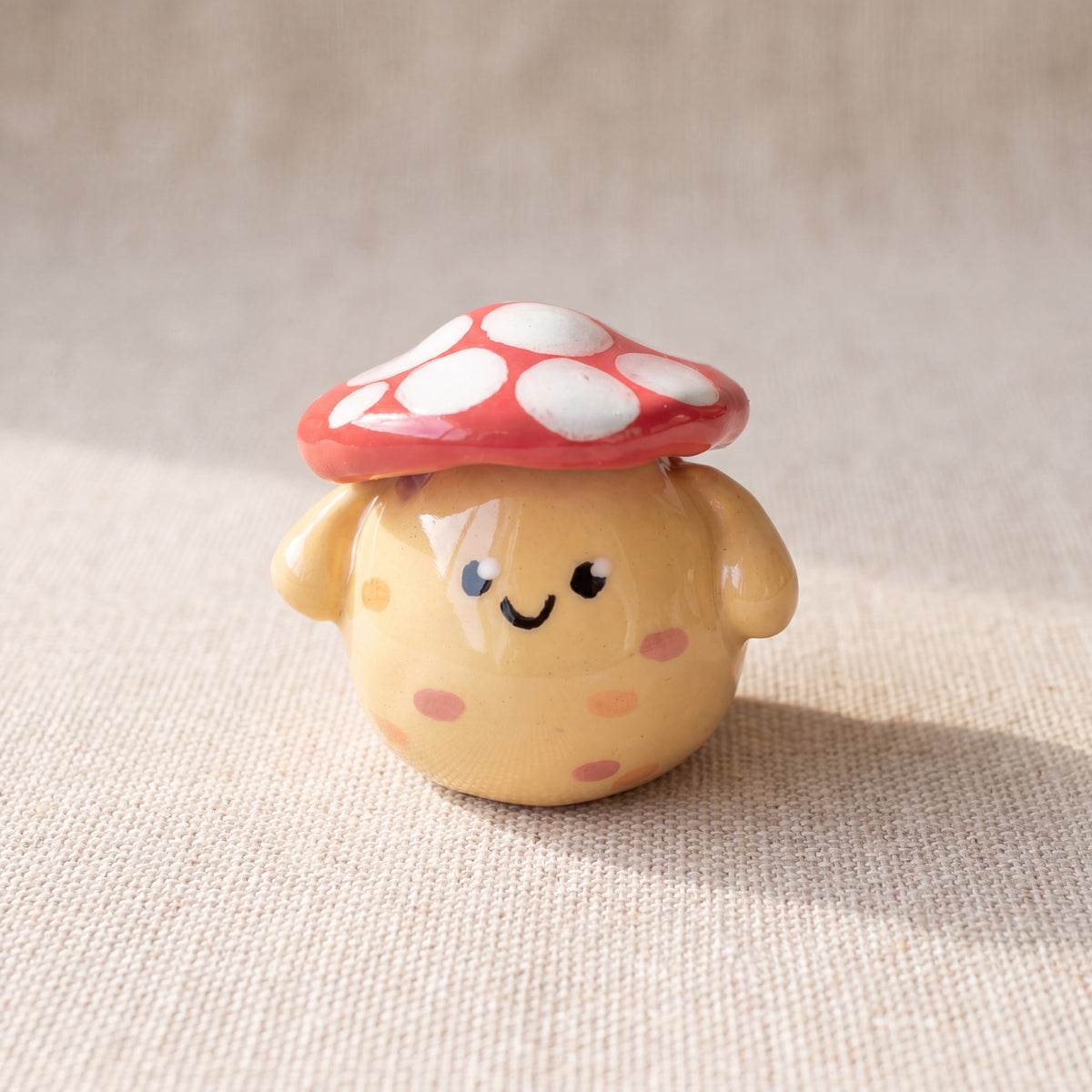 Mushroom Pal handmade glossy clay desk pal, front view