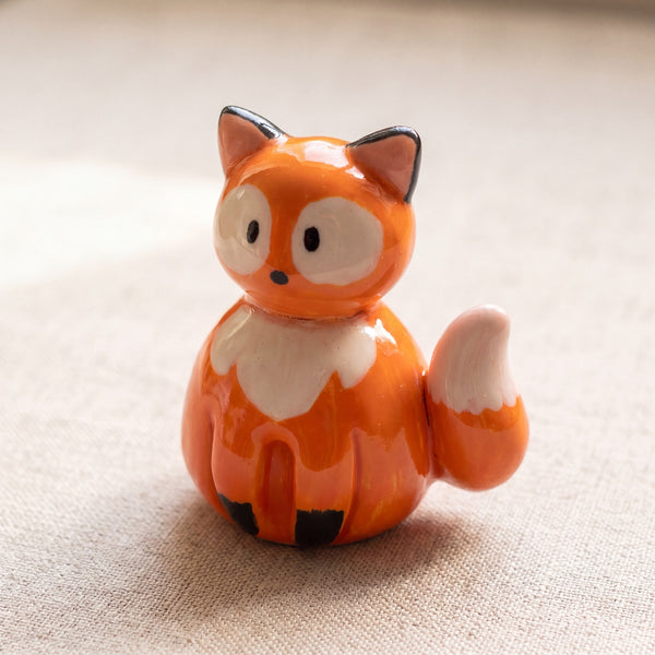 Mr. Fox handmade glossy clay desk pal, front view