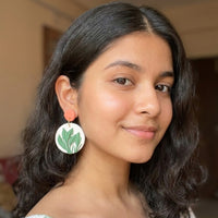 Just Leaves handmade polymer-clay earrings, worn on the ear
