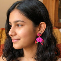Hibiscus Jungle handmade polymer-clay earrings, worn on the ear