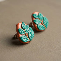 Leafy Studs handmade polymer-clay earrings, close-up detail of one earring