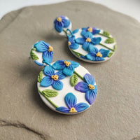 Himalayan Poppies handmade polymer-clay earrings, close-up detail of one earring