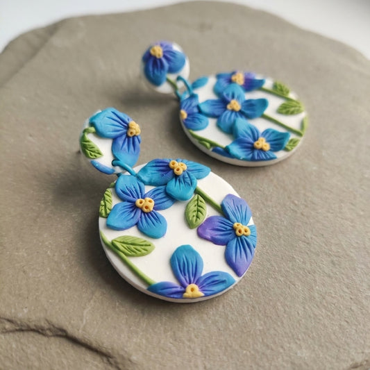 Himalayan Poppies handmade polymer-clay earrings, close-up detail of one earring