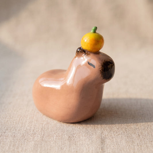 Capybara handmade glossy clay desk pal, front view