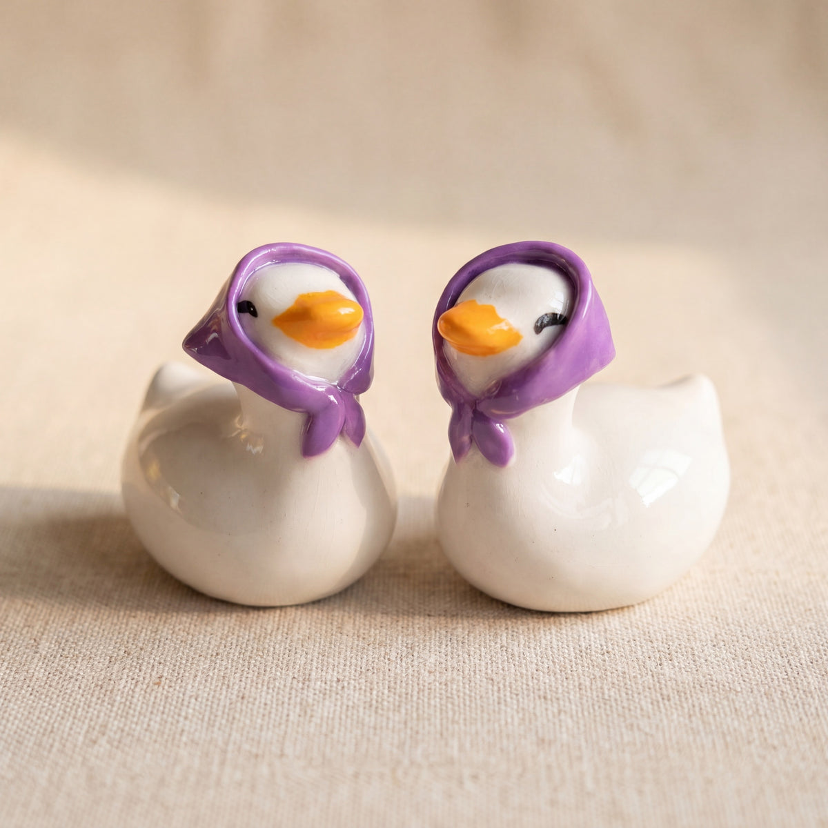 Happy Duck handmade glossy clay desk pal, front view