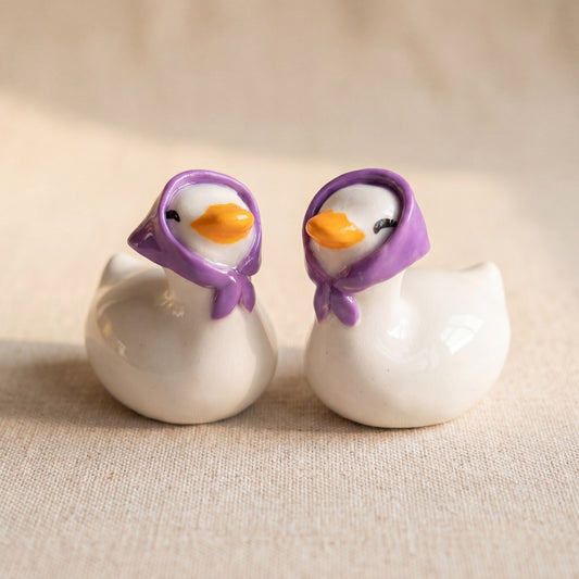Happy Duck handmade glossy clay desk pal, front view